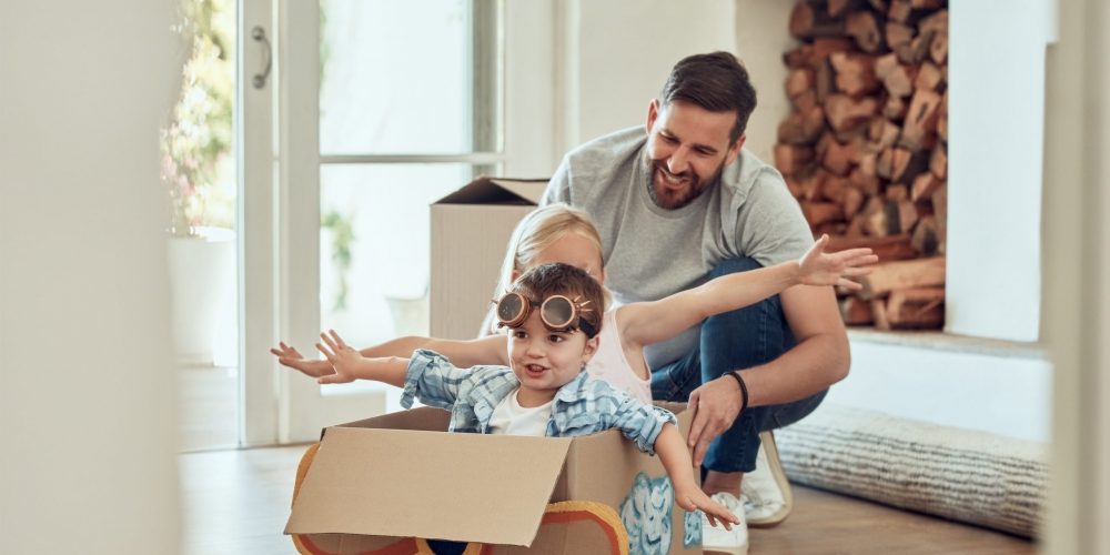 Dad,,Children,And,Home,With,Cardboard,Airplane,For,Playing,,Happiness young family in first home